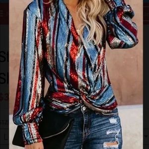 Vici Striking and cool sequin shirt with front twist. Size medium runs small